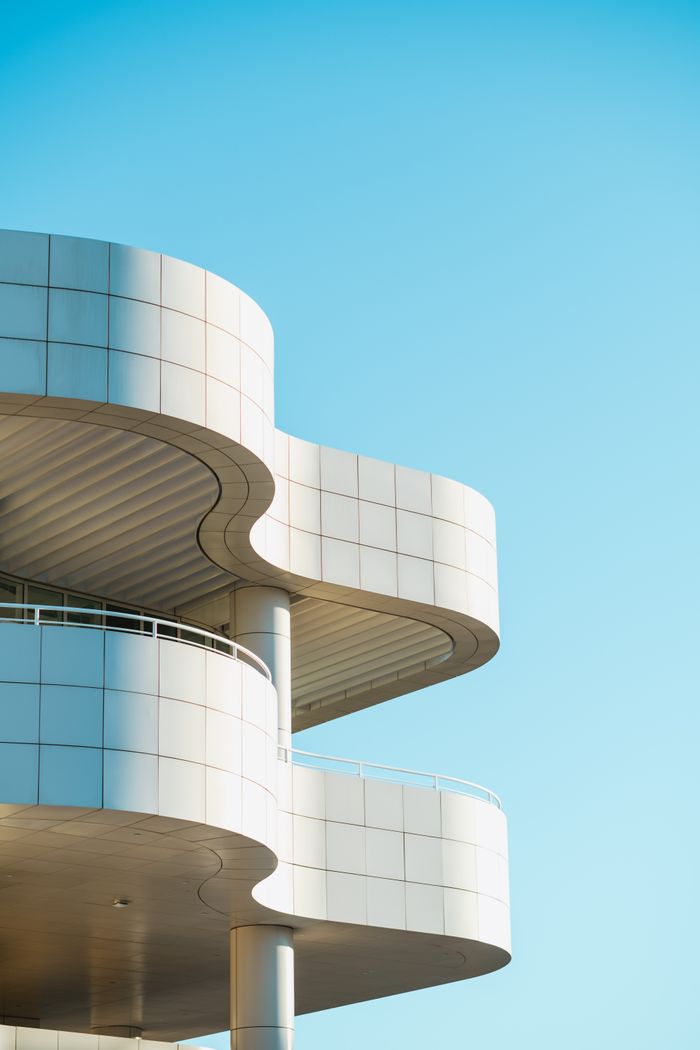 Home Stylish modern architecture at Getty Center in Los Angeles against a clear sky.